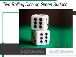 Two Rolling Dice On Green Surface