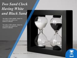 Two Sand Clock Having White And Black Sand