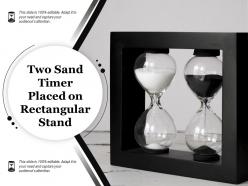 Two Sand Timer Placed On Rectangular Stand