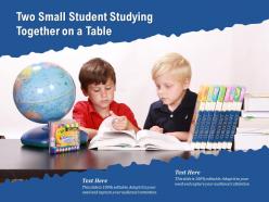 Two small student studying together on a table