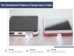 Two smartphone products in charge kept on table