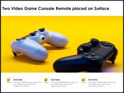 Two video game console remote placed on surface