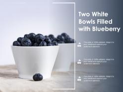 Two white bowls filled with blueberry