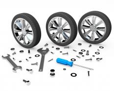 Tyres with tools like nut bolts wrench screwdriver stock photo