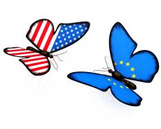 Us and european flag design two butterflies stock photo