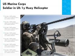 Us marine corps soldier in uh 1y huey helicopter