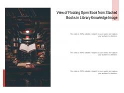 View of floating open book from stacked books in library knowledge image