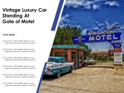 Vintage luxury car standing at gate of motel