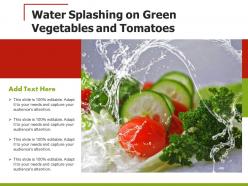 Water splashing on green vegetables and tomatoes