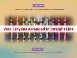 Wax crayons arranged in straight line