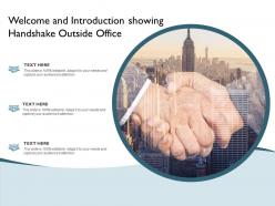 Welcome and introduction showing handshake outside office