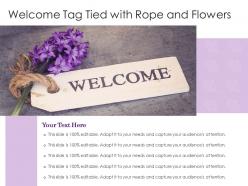 Welcome tag tied with rope and flowers