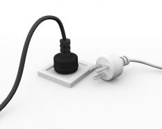 White and black power plugs for electricity connection stock photo