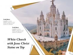 White church with jesus christ statue on top