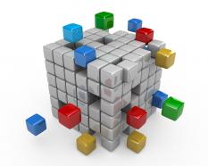 White cubes with colored cubes making solution stock photo