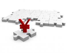 White puzzle mat with red yen symbol stock photo