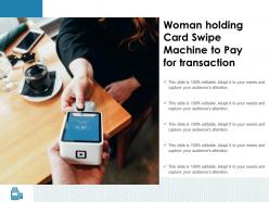 Woman holding card swipe machine to pay for