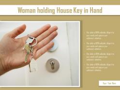 Woman Holding House Key In Hand