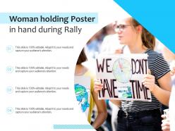 Woman holding poster in hand during rally
