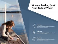 Woman reading  book near body of water