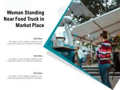Woman standing near food truck in market place