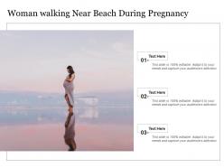 Woman walking near beach during pregnancy