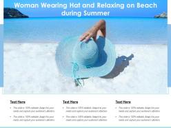 Woman wearing hat and relaxing on beach during summer