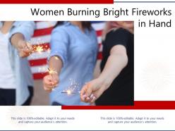 Women burning bright fireworks in hand