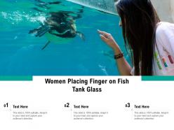 Women Placing Finger On Fish Tank Glass