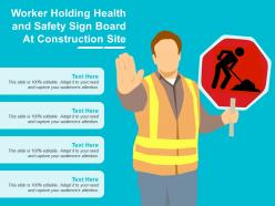 Worker holding health and safety sign board at construction site