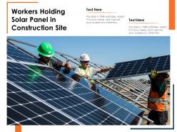 Workers Holding Solar Panel In Construction Site