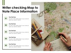 Writer checking map to note place information