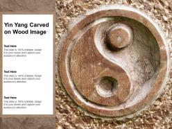 Yin Yang Carved On Wood Image