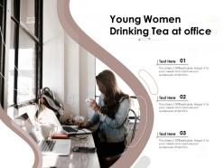 Young women drinking tea at office