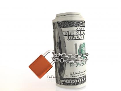 0914 dollars chained and locked for investment stock photo