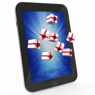 0914 gift boxes flying out from pc tablet stock photo