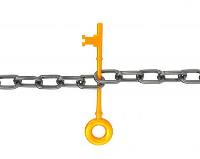 0914 golden key in chain link for security stock photo