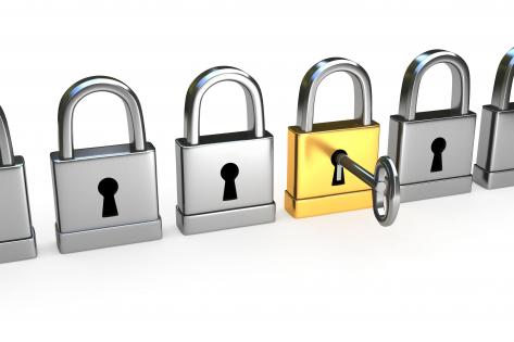 0914 golden lock with key along with silver locks stock photo