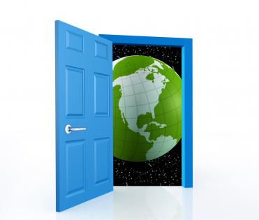 0914 open the door to a world of opportunities globe image stock photo