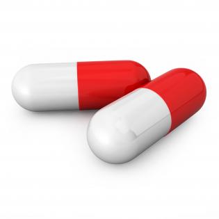 0914 red and white capsules for medical stock photo