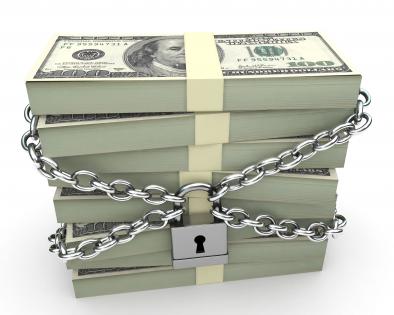 0914 stack of dollars secured padlock and chain stock photo