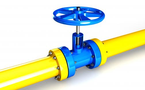 0914 yellow water supply pipeline with blue valve stock photo