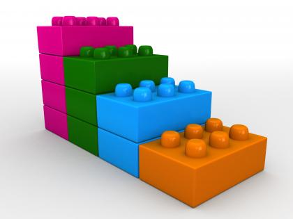 3d bar graph of four colored lego blocks stock photo