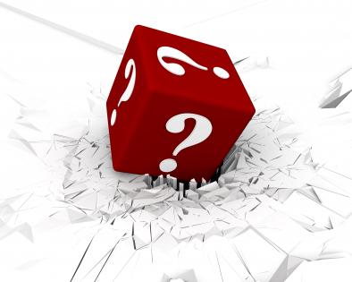 3d crack effect with red colored dice with white question mark stock photo