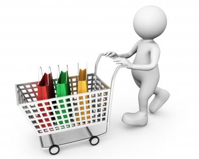 3d man carrying shopping bags in carts stock photo
