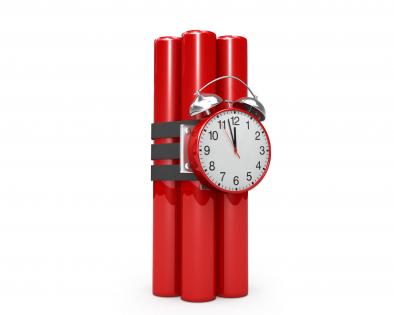 3d red colored time bomb stock photo