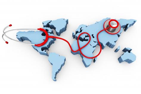 3d world map with stethoscope stock photo