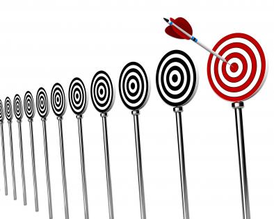 Aiming and hitting business targets stock photo