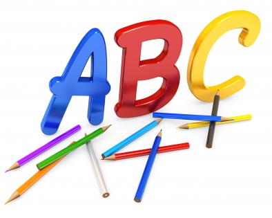 Alphabets with colored pencils stock photo