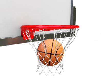 Ball inside ring for basketball game stock photo